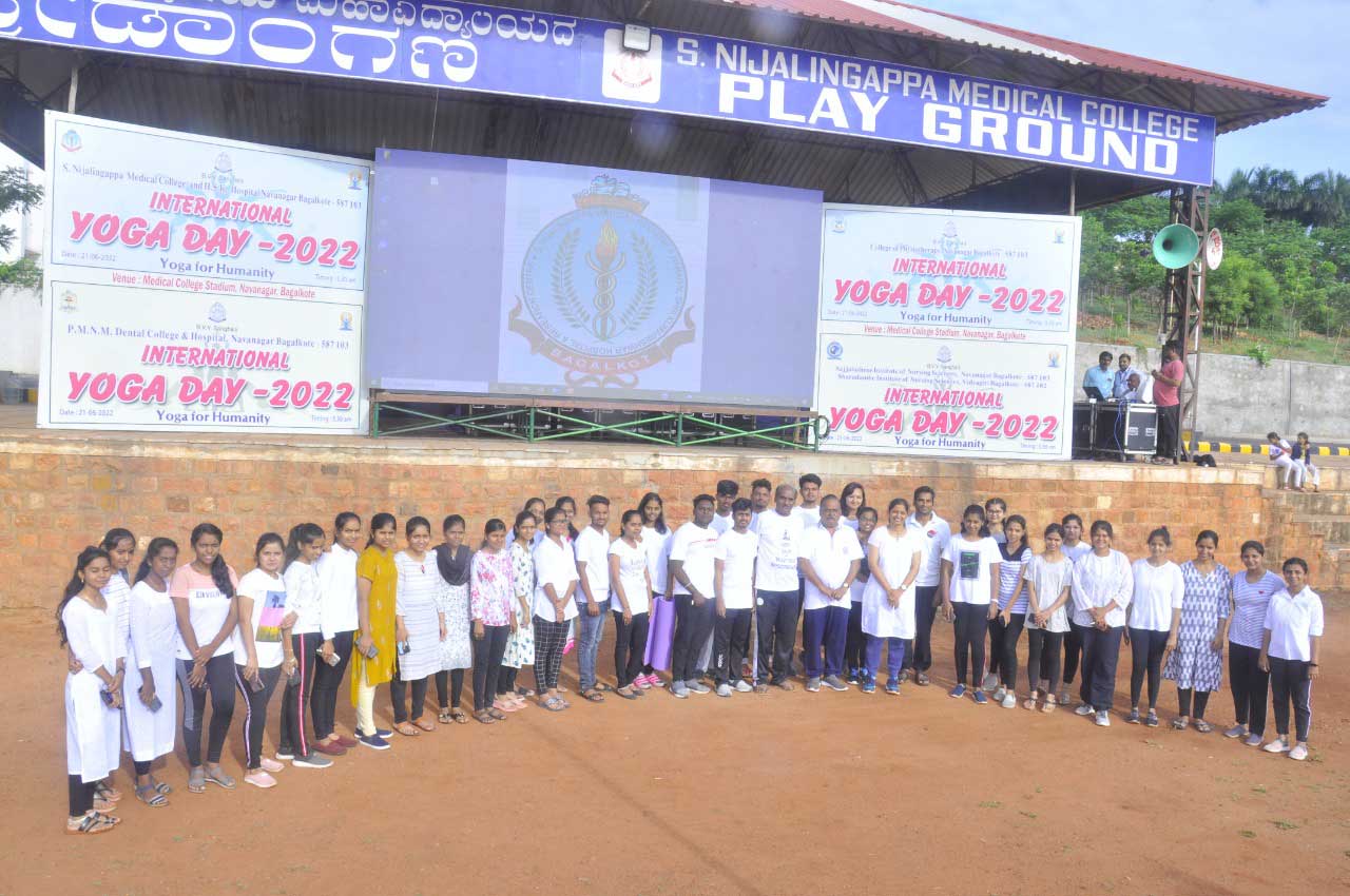 Students performing yoga during International Yoga Day at BVVS Physiotherapy College